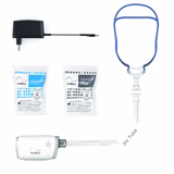 ResMed AirMini travel CPAP machine setup with power adapter, HumidX waterless humidifiers, tubing, and mask components for sleep apnea therapy.