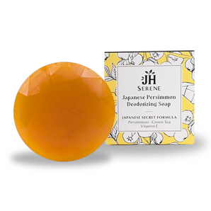 Japanese persimmon deodorizing soap with box packaging featuring illustrations and ingredient details such as persimmon, green tea, and vitamin E.